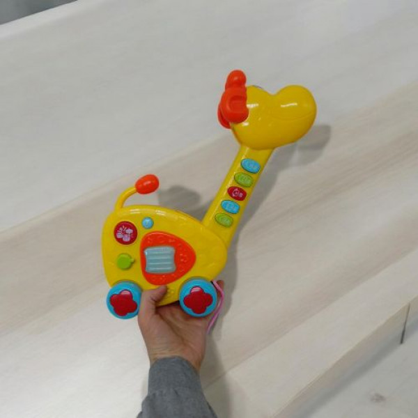 Гітара-каталка O-1155 жираф батар.муз.світ.кор.43*8,5*21,5